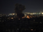 Smoke rises after an Israeli strike on Beirut's southern suburbs