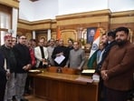Leader of opposition Jai Ram Thakur along with BJP legislators handing over the privilege motion notice against chief minister Sukhvinder Singh Sukhu to Himachal Pradesh Vidhan Sabha Speaker Kuldeep Singh Pathania in Shimla on Wednesday. (HT Photo)