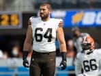 Cleveland Browns center JC Tretter (64) warms up before an NFL football game against the Los Angeles Chargers, Oct. 10, 2021, in Inglewood, California.