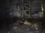 Parts of the compound wall, gallery, and staircase structure gave way with reports of people being trapped inside the building. (HT)