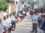 People stand in long queues amid ongoing LPG shortage at Ashok Gas Agency in Phoolbagh Colony on Kursi Road in Lucknow on Wednesday. (Deepak Gupta/HT)