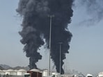 Smoke rises from the direction of an energy installation in the Gulf emirate of Fujairah on March 14. 