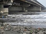 Water level drops in the Yamuna River near ITO Ghat, exposing the riverbed, in New Delhi, India. Water level drops in the Yamuna River near ITO Ghat, exposing the riverbed, in New Delhi, India.