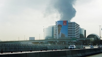 Smoke rising from an area near the Dubai International Airport after a drone attack hit a fuel tank, amid the U.S.-Israel conflict with Iran. (REUTERS/Stringer/File Photo)
