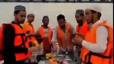 Screengrab of the video showing Muslim youth hosting iftar party on a boat in river Ganga Screengrab of the video showing Muslim youth hosting iftar party on a boat in river Ganga