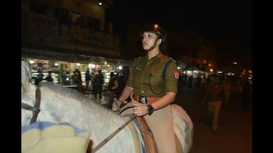 A woman police officer patrols on horseback during a night deployment, symbolising the growing strength, visibility and leadership of women in uniform across Uttar Pradesh Police. (File photo)