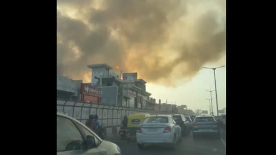 Plumes of smoke emanating from the fire in a building in Palam, Delhi, on Wednesday. (Sylvester Tamang/ HT Photo)