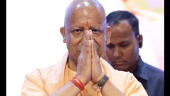 The CM also released a booklet titled ‘Nav Nirman Ke 9 Varsh’ on the occasion. (HT Photo)