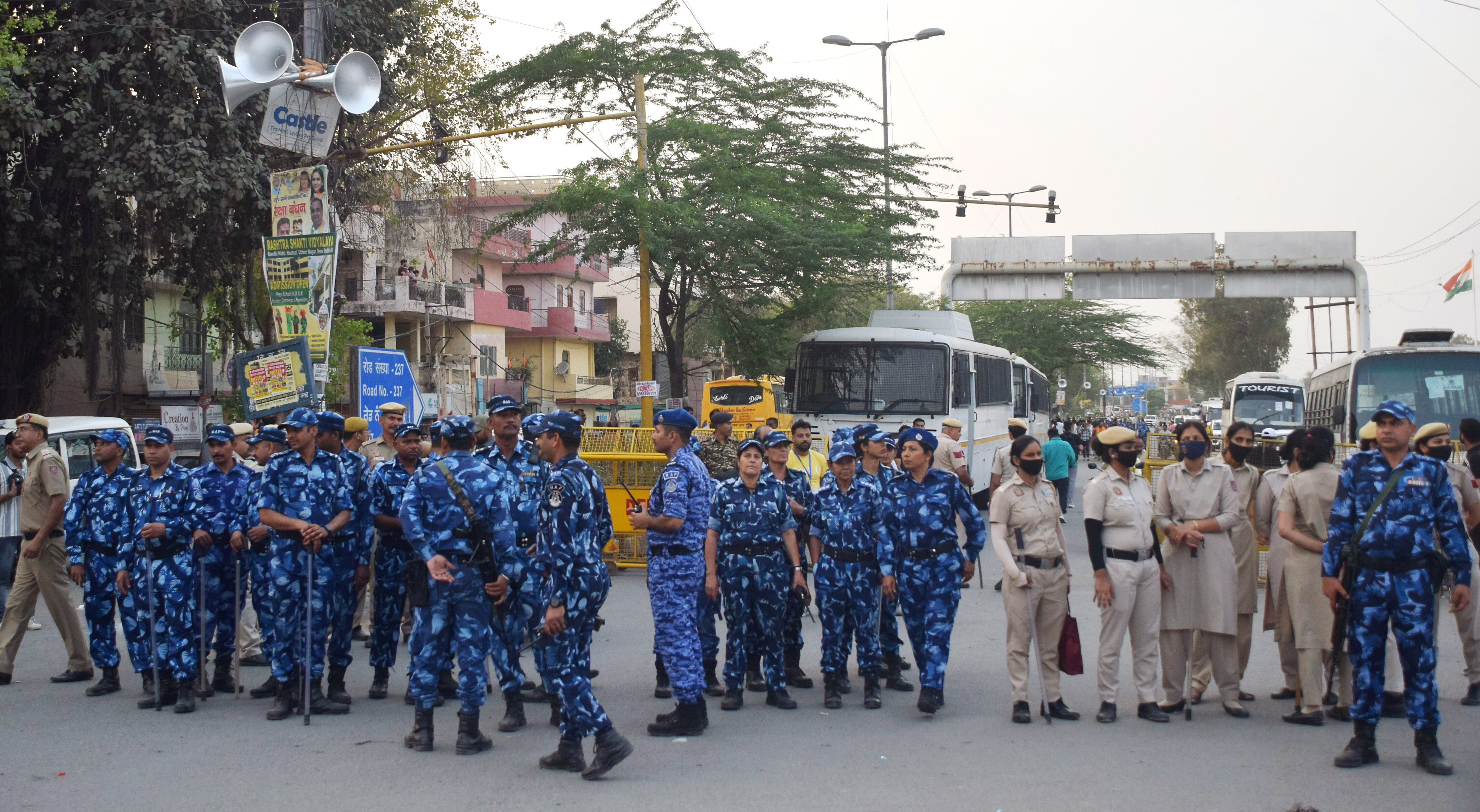 Security personnel stand guard during the "Virat Aakrosh Sabha" called by the United Hindu Front over the death of Tarun, due to an alleged fight during Holi at Uttam Nagar, in Delhi on Sunday. (ANI) Security personnel stand guard during the "Virat Aakrosh Sabha" called by the United Hindu Front over the death of Tarun, due to an alleged fight during Holi at Uttam Nagar, in Delhi on Sunday. (ANI)