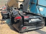 A speeding trailer rammed into two cars and then toppled onto an Innova, resulting in the death of three people stuck in the car.