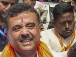 BJP workers celebrated Adhikari’s arrival with drumbeats, posters and party flags. (PTI photo) BJP workers celebrated Adhikari’s arrival with drumbeats, posters and party flags. (PTI photo)