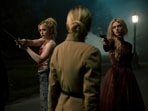 This image released by Searchlight Pictures shows Kathryn Newton, from left, Sarah Michelle Gellar, and Samara Weaving in a scene from "Ready or Not 2: Here I Come." (Pief Weyman/Searchlight Pictures via AP)