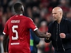 Liverpool coach Arne Slot greets Ibrahima Konate after the victory against Galatasaray at Anfield in Liverpool. (AFP)