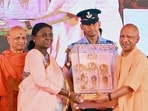 President Droupadi Murmu being felicitated Uttar Pradesh Chief Minister Yogi Adityanath at the Shri Ram Yantra Sthapana event at Shri Ram Janmbhoomi Mandir, in Ayodhya on Thursday. (ANI)