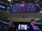 Stock market numbers are displayed as traders work on the floor of the New York Stock Exchange during morning trading on March 12, 2026 in New York City. Stock market numbers are displayed as traders work on the floor of the New York Stock Exchange during morning trading on March 12, 2026 in New York City.