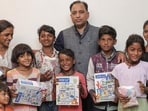 Vijay Ram Rattan during his visit to the children. (HT) Vijay Ram Rattan during his visit to the children. (HT)