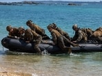 U.S. Marines landing in a simulated small-boat raid, part of exercises in Okinawa, Japan, last month.