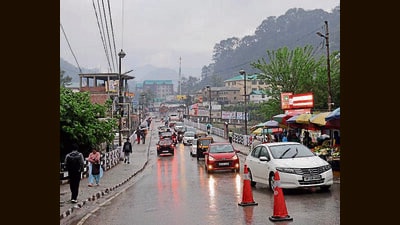 A road in Mandi after showers on Thursday. (Birbal Sharma/HT)