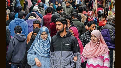 A street flooded with people in Srinagar on Thursday. (AFP) A street flooded with people in Srinagar on Thursday. (AFP)
