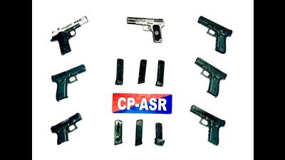 The recovered weapons include five 9MM Glock pistols and two .30-bore pistols (HT File) The recovered weapons include five 9MM Glock pistols and two .30-bore pistols (HT File)