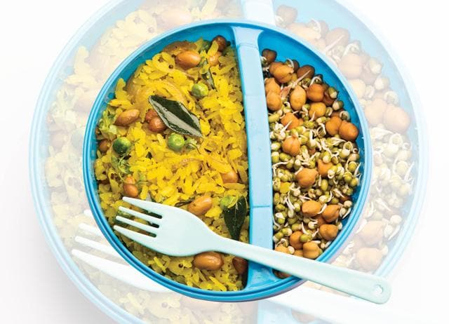 Before you gobble up poha, pre-load by eating a small bowl of salad or a glass of chaas. (SHUTTERSTOCK)