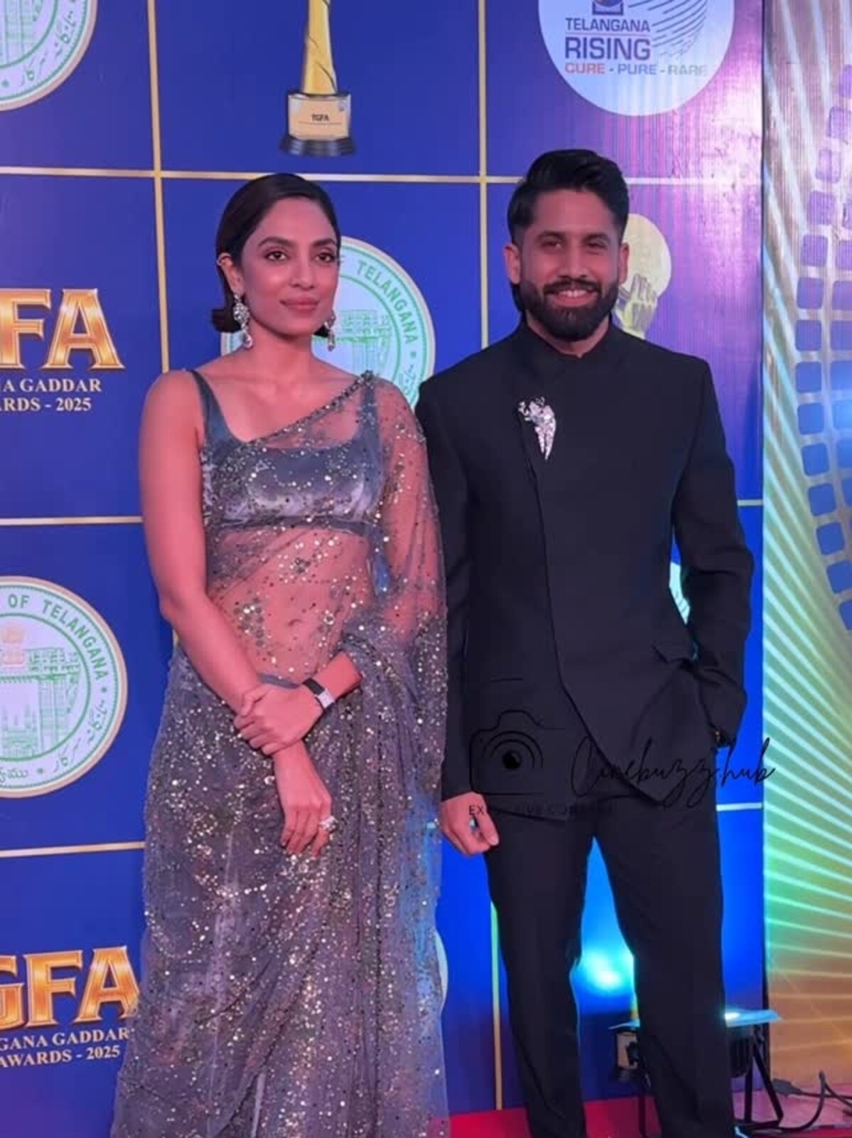 naga chaitanya formal dresses in classic black bandhgala look outshines Sobhita Dhulipala's stylish saree at awards night Style_Lily