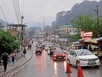 A road in Mandi after showers on Thursday. (Birbal Sharma/HT)