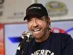 Actor Chuck Norris speaks with the media during a press conference prior to the NASCAR Sprint Cup Series AAA Texas 500 at Texas Motor Speedway 