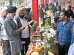 Farmers from all over the Punjab at Kisan mela orgainsed by Punjab Agricultural University, in Ludhiana on Friday. (HT Photo)