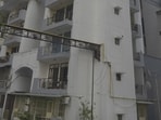 Officials said the man lived with his mother in the flat while his wife and son stayed in a flat at another township near National Highway-9, which was also near the high-rise from where the man jumped. (Sakib Ali/HT Photo)