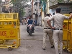 New Delhi: Police personnel stand guard at barricades ahead of Eid al-Fitr, at Uttam Nagar.