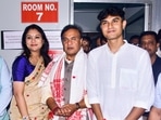 Assam chief minister Himanta Biswa Sarma, centre, with his wife Riniki Bhuyan Sharma, left, and son Nandil Biswa Sarma. (PTI)