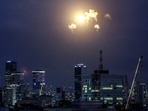 Explosions from projectile interceptions by Israel's Iron Dome missile defence system are pictured over Tel Aviv on February 28, 2026. 