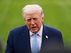 President Donald Trump speaks with reporters before departing on Marine One from the South Lawn of the White House.