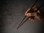 Wang occasionally felt the chopstick in his throat but considered it a normal reaction to drinking.