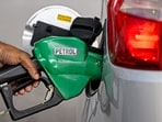 File: A petrol pump attendant refuels a vehicle at a Bharat Petroleum (BP) gas station in Delhi 