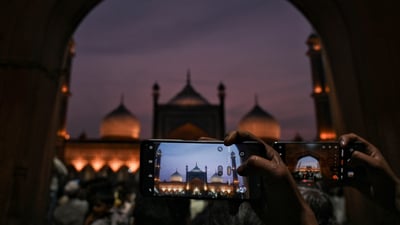 Gram it: An illuminated view of the Jama Masjid as several visitors gathered here to break their fast on Friday. Such was the scene on the last day of Ramzan, which heralds Eid, today. Eid mubarak! (Photo: ANI )