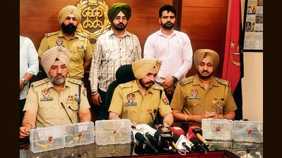 Police officials giving details about the incident. (HT) Police officials giving details about the incident. (HT)