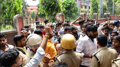 Students and police personnel at the Udai Pratap College in Varanasi on Friday. (HT Photo) Students and police personnel at the Udai Pratap College in Varanasi on Friday. (HT Photo)