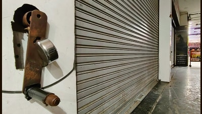 The showrooms —Sera Photo Store and AD’s Mobile Arcade — were sealed after their structures were found ‘unsafe’. (HT Photo) The showrooms —Sera Photo Store and AD’s Mobile Arcade — were sealed after their structures were found ‘unsafe’. (HT Photo)