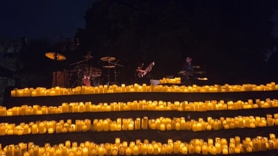 Warm, ambient lighting by the candles mixed with the instrumental melody from the ensemble makes candelight concerts meditative in nature. (Picture credit: Adrija Dey) Warm, ambient lighting by the candles mixed with the instrumental melody from the ensemble makes candelight concerts meditative in nature. (Picture credit: Adrija Dey)