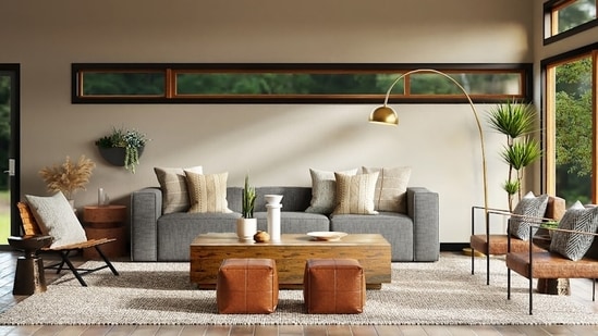 Wall colours play a major role in changing the entire ambience and feel of the living room. (Unsplash)