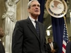(FILES) Federal Bureau of Investigation (FBI) Director Robert Mueller following a farewell retirement ceremony in his honor at the Department of Justice on August 1, 2013. Mueller, the former FBI director who led a politically explosive investigation into President Donald Trump, has died aged 81, US media reported Saturday. (Photo by Saul LOEB / AFP)