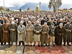People offer prayers on the occasion of Eid-ul-Fitr,at Hazratbal shrine, in Srinagar, on Saturday. (Waseem Andrabi/HT)