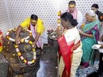 President Droupadi Murmu with governor Anandiben Patel offers prayers at the Daan Ghati Temple, in Govardhan, near Mathura, on Saturday. (PTI) President Droupadi Murmu with governor Anandiben Patel offers prayers at the Daan Ghati Temple, in Govardhan, near Mathura, on Saturday. (PTI)
