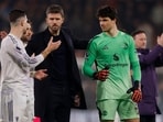 Manchester United interim manager Michael Carrick with Diogo Dalot and Lammens after the match.