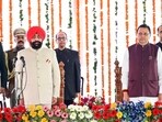 Uttarakhand chief minister Pushkar Singh Dhami expanded his cabinet on Friday, with five MLAs taking oath as ministers at the Lok Bhavan in Dehradun. (ANI PHOTO)