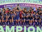 Japanese players celebrate after winning against Australia.