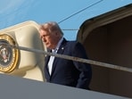President Donald Trump steps off Air Force One, Friday, March 20, at Palm Beach International Airport 