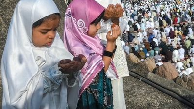 Muslim girls offer Eid prayers, which marks the end of the Islamic holy fasting month of Ramadan, at the Jama Masjid in Ahmedabad. (AFP Photo) Muslim girls offer Eid prayers, which marks the end of the Islamic holy fasting month of Ramadan, at the Jama Masjid in Ahmedabad. (AFP Photo)